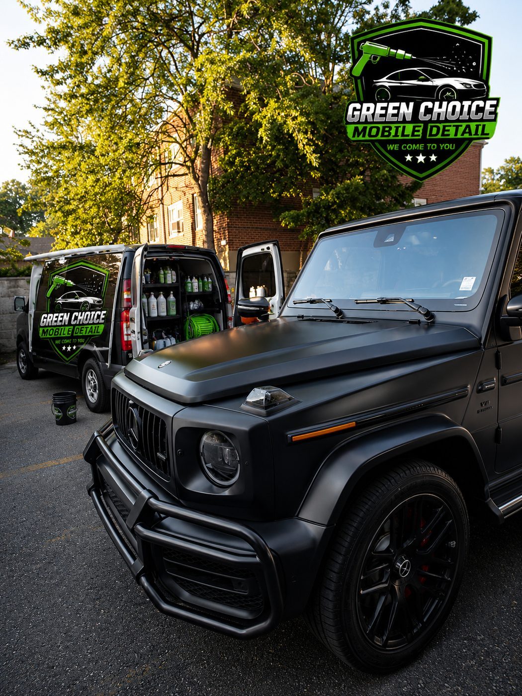 Green Choice Mobile Detail open equipped van beside a matte black Mercedes G63